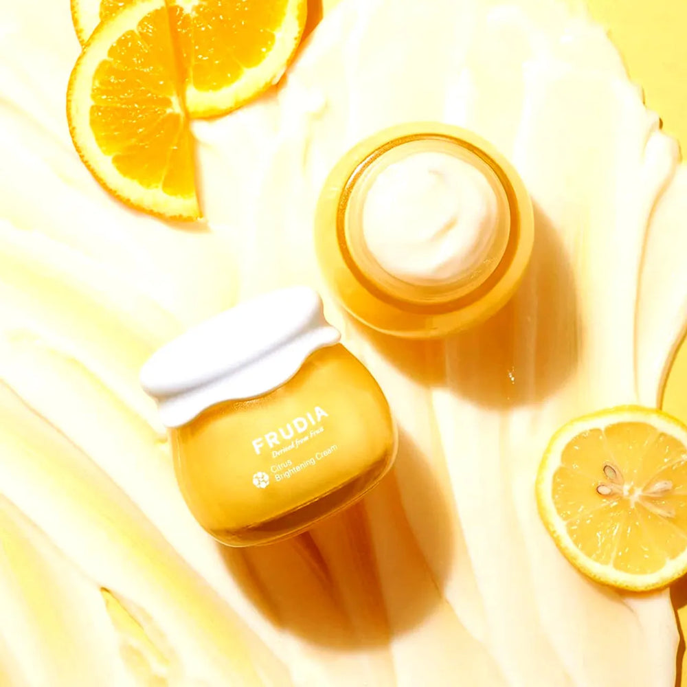 Yellow jar with white lid featuring the brand 'Frudia' on a white background